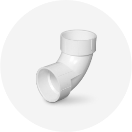 A white P V C elbow fitting.