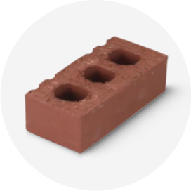 A red clay cored standard construction brick.