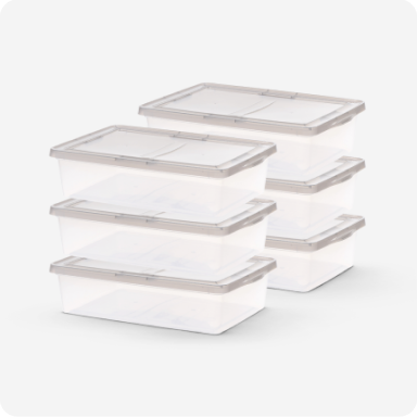 Two stacks of 3 clear storage totes with gray lids.