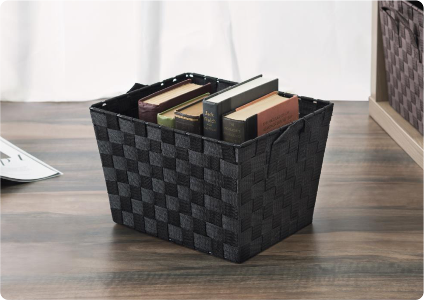 A black woven storage bin.