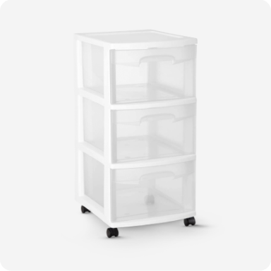 A white rolling storage cart with 3 clear plastic drawers.