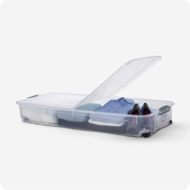 A clear, slim plastic container for underbed clothes storage.