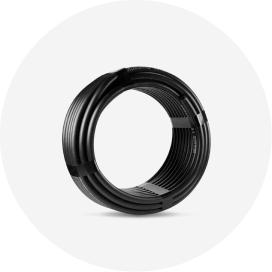 A coil of black drip irrigation tubing.