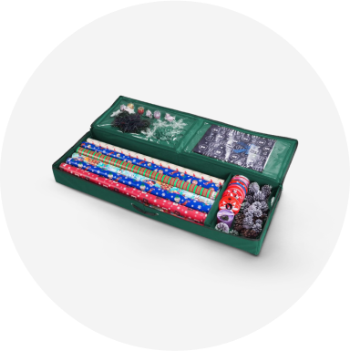 A green wrapping paper organizer filled with wrapping paper, bows and other wrapping supplies.