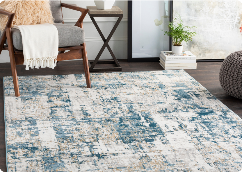 An Origin 21 with STAINMASTER Quatro 8-foot by 10-foot indoor area rug.	