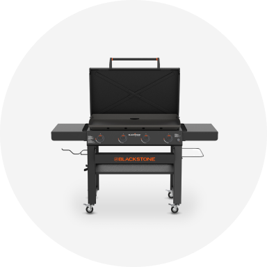 A black and stainless steel Weber gas grill.