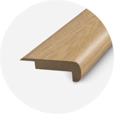 A light brown piece of stair nosing.