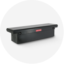 A black CRAFTSMAN crossover truck tool box.