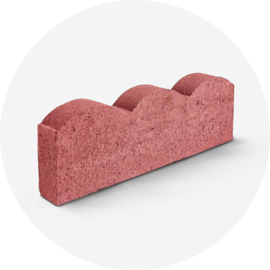 A red scallop-top edging stone.